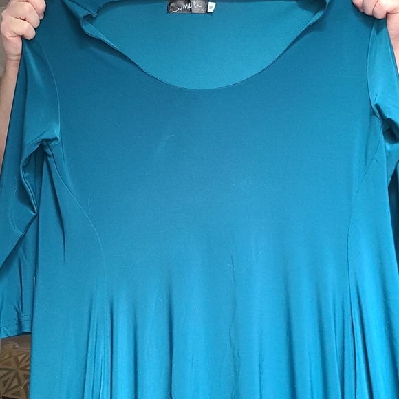 Blue dress with cut out ruffle bottom - Picture 1 of 4